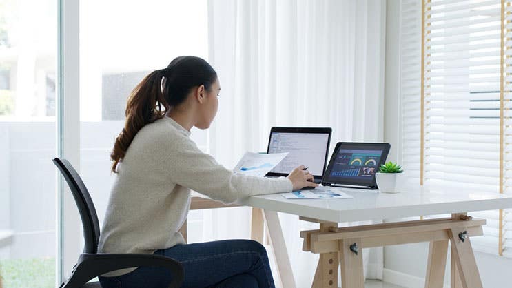 woman using computers for research